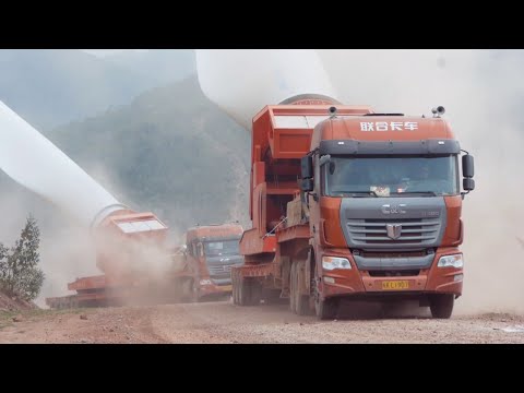 C&amp;C trucks carrying wind turbine blades to the mountaintop